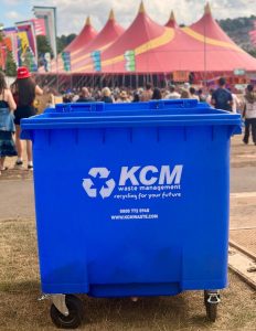 KCM Waste Management wheelie bin at a UK music festival providing professional event waste management and recycling services.